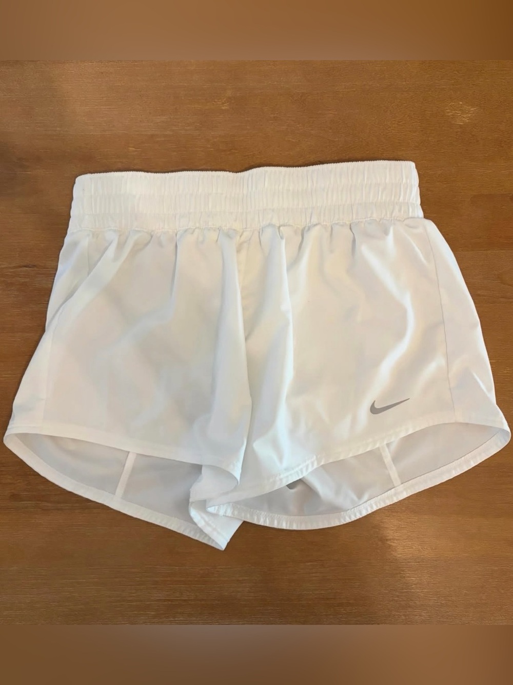 Nike White Athletic Running Shorts with Silver Swoosh